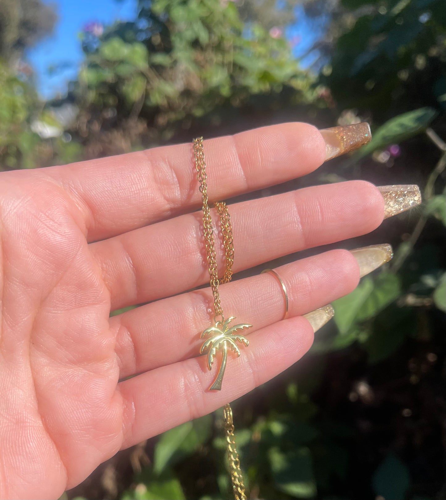 Gold palm tree necklace
